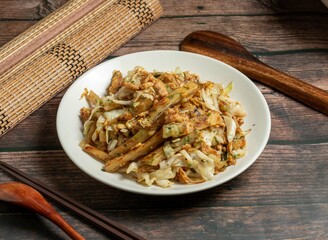 Fried Scallion Pancakes in a dish isolated on mat side view on dark wooden table taiwan food