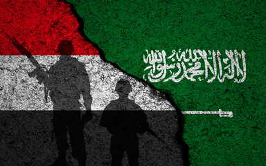 Yemen and Saudi Arabia flags background. Cracked wall. Houthi-Saudi Arabian conflict and war concept photo