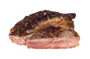 cut medium well fried rib eye beef steak isolated on white background