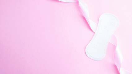 Feminine hygiene menstrual pads. Menstruation napkin for woman hygiene on pink background. Menstruation feminine period. Menstruation, critical days, zero waste, eco, ecology banner.