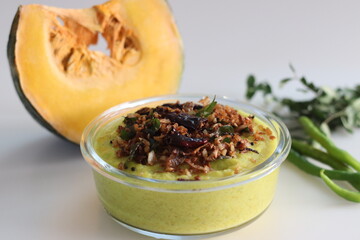 Coconut based pumpkin curry. A pumpkin side dish to go with rice, part of kerala meals. Commonly known as Pumpkin erissery.