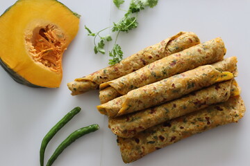 Pumpkin paratha, Indian flat bread made of whole wheat flour, grated pumpkin, fresh coriander leaved and spices