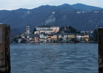 Fototapeta na wymiar the Island of San Giulio, in front of the town of Orta which gives its name to the lake