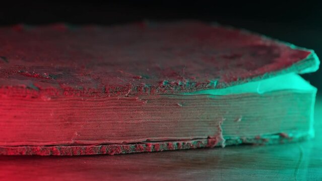 Old dusty book with magic light