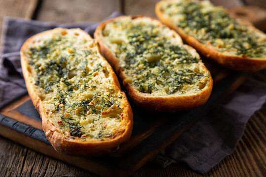 Crispy bread with garlic butter and dill