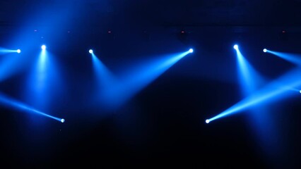 Stage  lighting beams spotlight and smoke of events show or concerts
