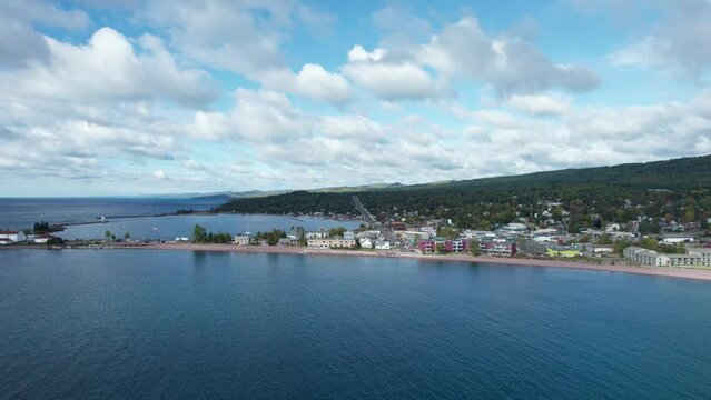 Drone aerial view over lake superior of Grand Marais in the summer