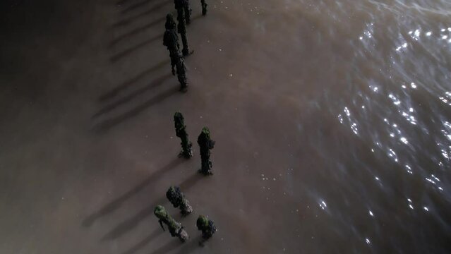 Overhead drone view of posts in sea River blackwater old fish traps
