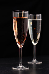 Sparkling white wine or cava or prosecco in champagne glass with bubbles