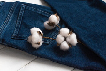 Concept of slow fashion. Basic jeans made of organic cotton that can be worn for many years.