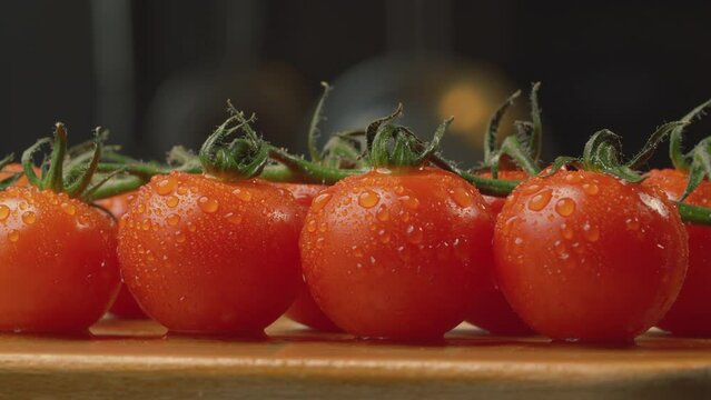 Fresh tomatoes with drops of water