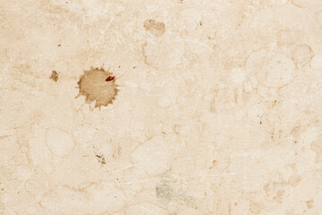 Aged and worn paper texture, grunge background, dirt surface with spots, scratches. Vintage...