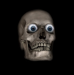 A scary human skull with blue eyes on a black background.
