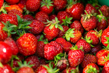 Fresh red ripe organic strawberry background. Close up, top view