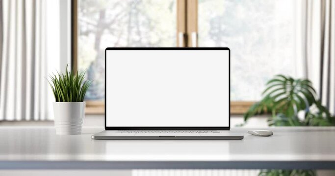 Laptop with blank screen smooth zoom-in. White table with mouse and smartphone. Home interior or office background, 4k 60fps UHD