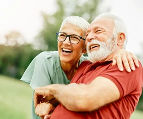Fotobehang woman man outdoor senior couple happy lifestyle retirement together smiling love fun elderly active vitality nature mature © Lumos sp