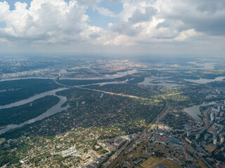 High flight over Kiev. Cloudy day. Aerial drone view.
