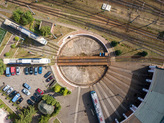 Round turning railroad arrow. Aerial drone top view.