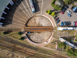 Round turning railroad arrow. Aerial drone top view.