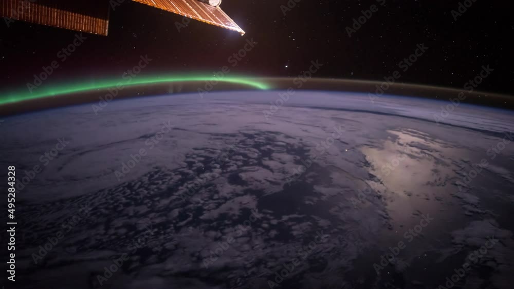 Wall mural flight over the earth's surface, made from a space station. 3d rendering