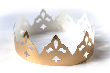 Gold paper king crown isolated on white