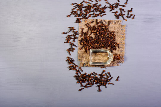 Clove Grains And A Bottle Of Clove Oil. For Dieters