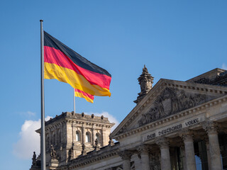 Fototapeta na wymiar German Flag Flying Over Reichstag Bundestag