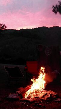 Film montage shot of campfire during sunset