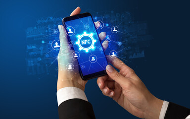 Hand using smartphone with technology concept