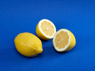 yellow cut lemon with blue background