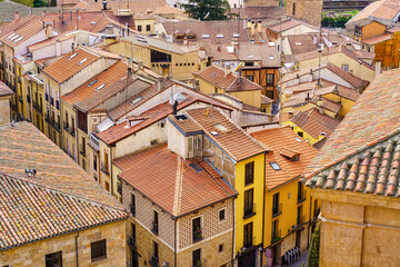 Aerial view of the rooftops and old houses of the medieval city of Salamanca, Spain.