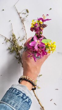 woman with bottle of flowers