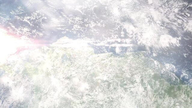 Earth zoom in from outer space to city. Zooming on Puerto Cabello, Carabobo, Venezuela. The animation continues by zoom out through clouds and atmosphere into space. Images from NASA