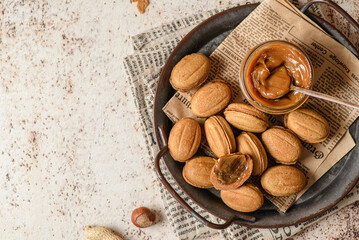 cookies with caramel on a tray