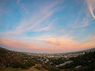 Fototapeta premium Sunset high angle view of the Los Angeles cityscape from hollywood bowl