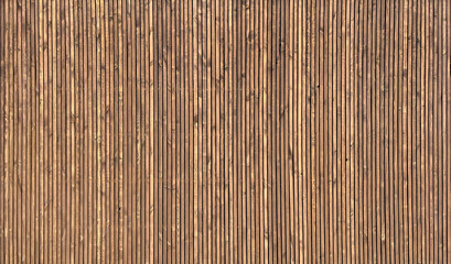 Wooden decorative screwed facade of the building, wooden planks. Pattern or texture