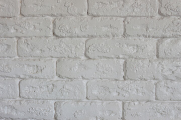 White brick wall is a great background for a cozy interior of the house