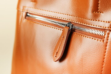 zipper on the leather bag close-up