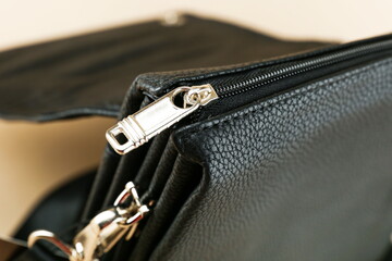 zipper on the leather bag close-up © Petr Smagin