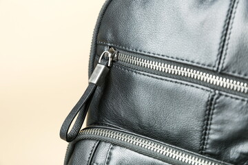 zipper on the leather bag close-up