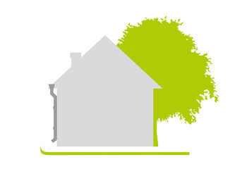 House on a green lawn next to a tree. A flat one-color house, simple in shape. Sunny day. Isolated