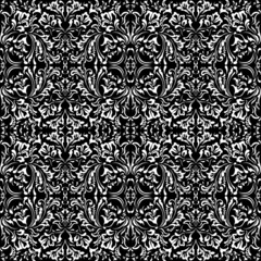 Decorative floral swirl seamless pattern on black background
