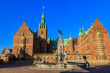 Fototapeta premium Neptune Fountain in a front of Frederiksborg castle in Hillerod, Denmark
