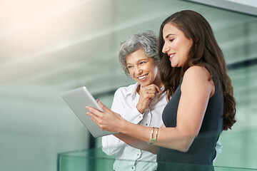 Things are looking impressive so far. Cropped shot of colleagues working together on a digital...