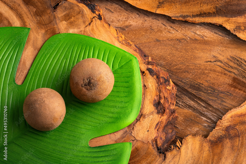 Poster Organic sapodilla tropical fruit - Manilkara zapota