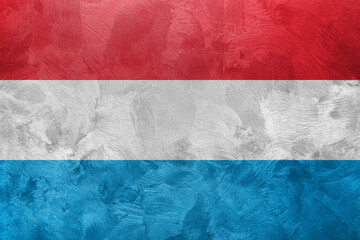 Textured photo of the flag of Luxembourg.