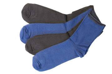 Several socks spread out like a fan on a white