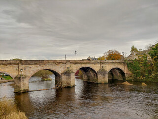 Fototapeta premium Wetherby bridge, river, weir, West Yorkshire, England, UK