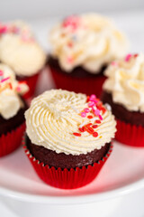 Red Velvet Cupcakes with White Chocolate Ganache Frosting