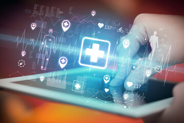 Fototapeta premium Close-up of a touchscreen with healthcare icons